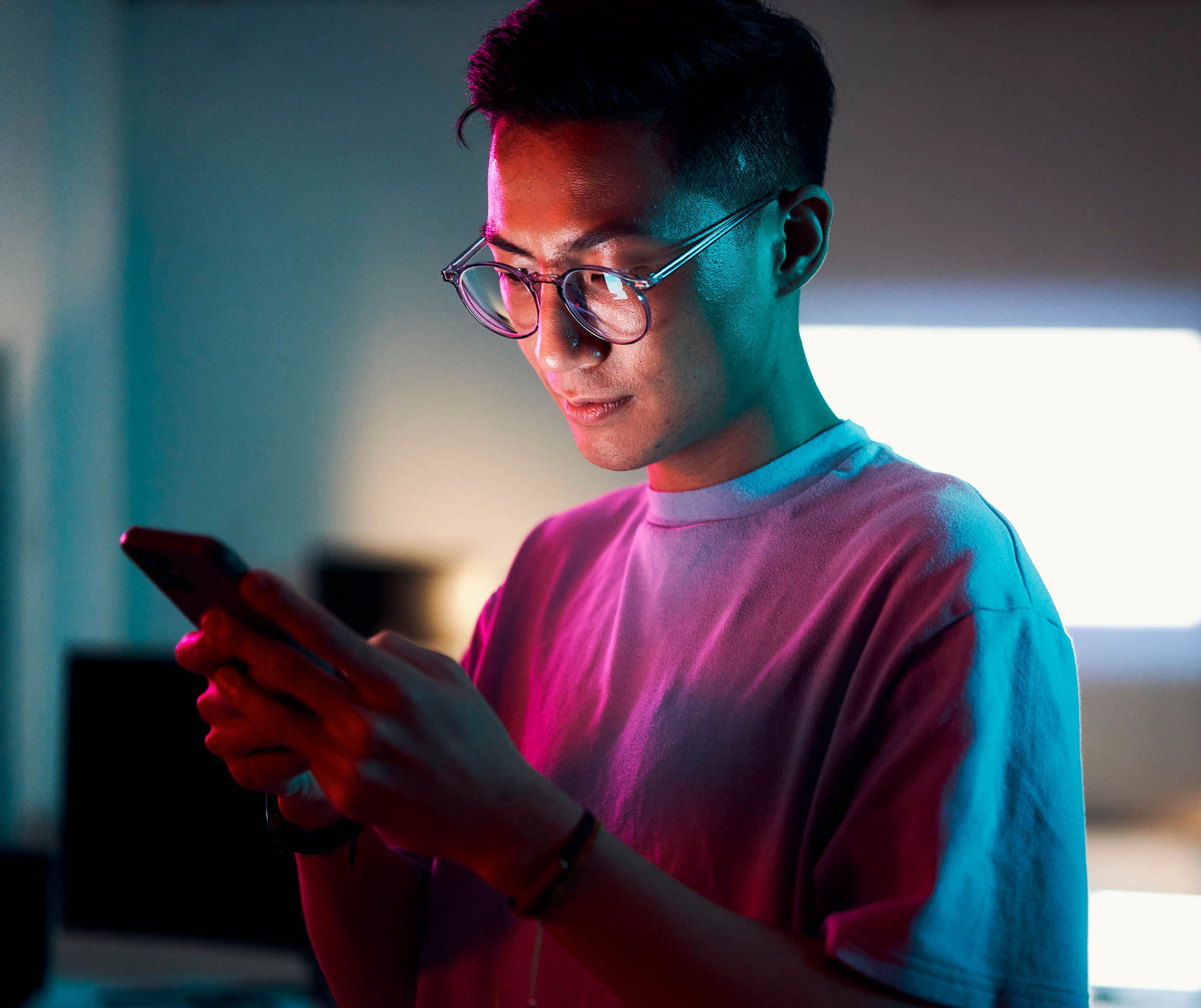 A man looking at his phone